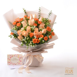 Flowerg Flower's custom mixed bouquet with roses, eryngium, and spray roses, perfect for birthdays and mothers.
